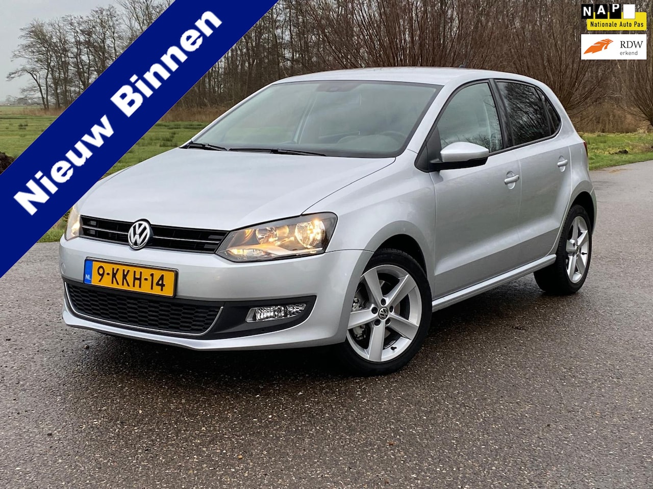 Volkswagen Polo - 1.2 TSI BlueMotion Highline / Automaat / 14.295 KM / Navigatie / Climate Control / Cruise - AutoWereld.nl