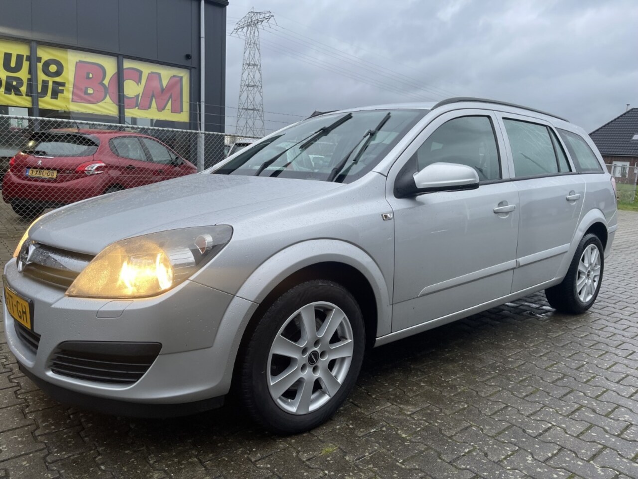 Opel Astra Wagon - 1.9 CDTi Business AIRCO 6-BAK - AutoWereld.nl