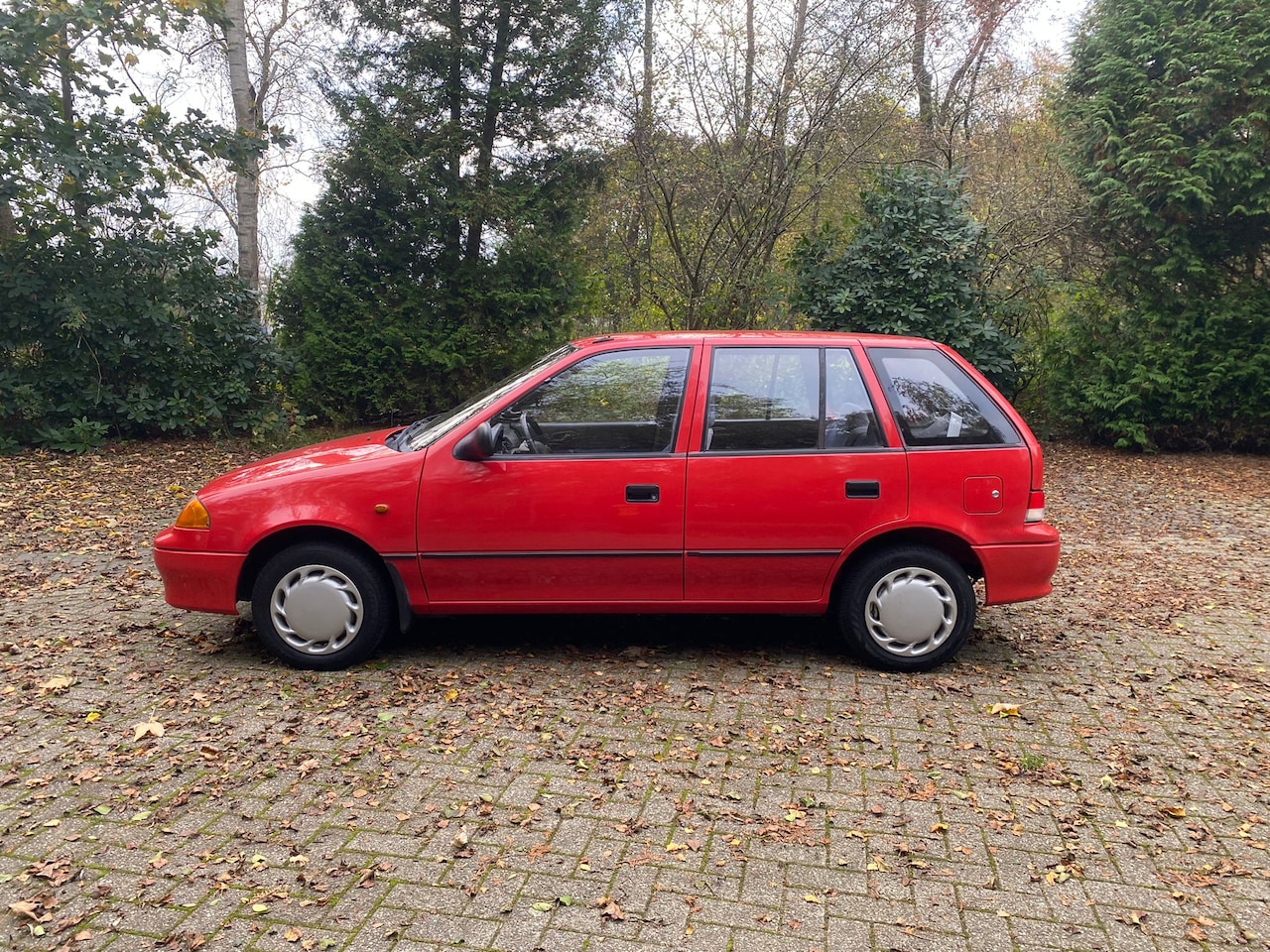 Suzuki Swift - 1.0 GLX - AutoWereld.nl