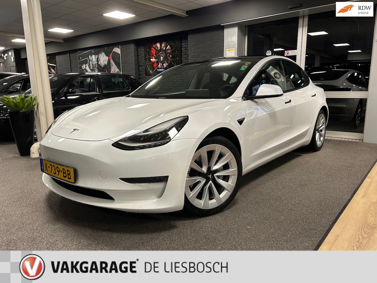 Tesla Model 3 - Long Range RWD Long Range AWD 75 kWh / stoel verwarming / trekhaak / panorama-dak /autopilot beta - AutoWereld.nl