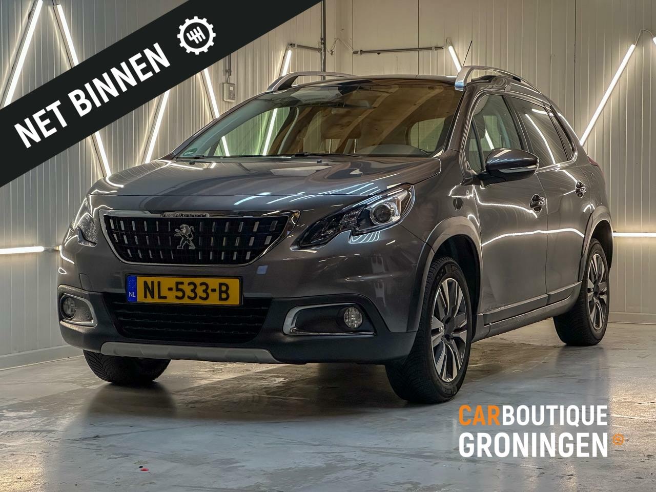 Peugeot 2008 - 1.2 PureTech Blue Lion | PANORAMA | LEER | TREKHK - AutoWereld.nl