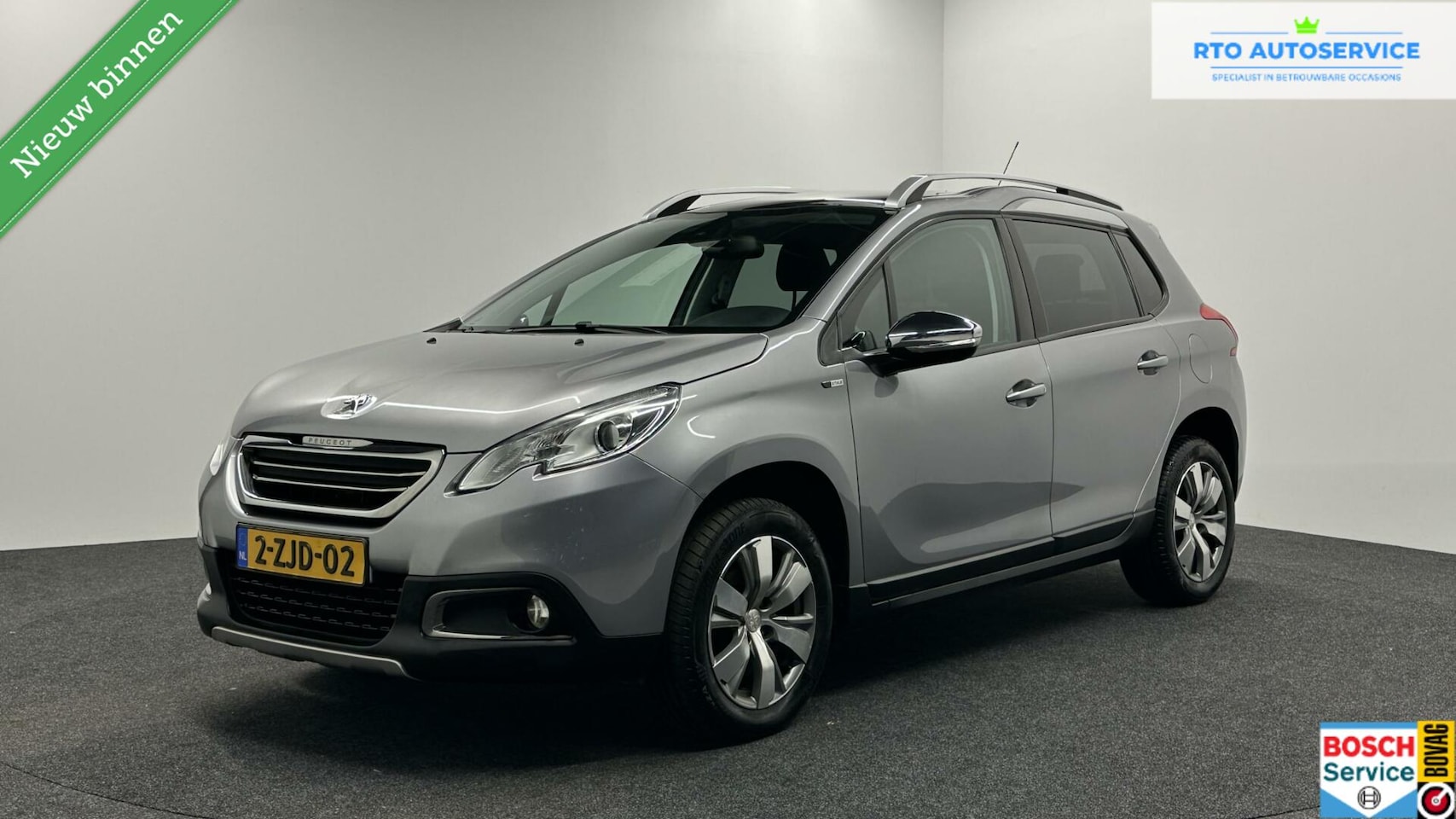 Peugeot 2008 - 1.2 PureTech Allure Pack Premium Plus NAVI PANO - AutoWereld.nl