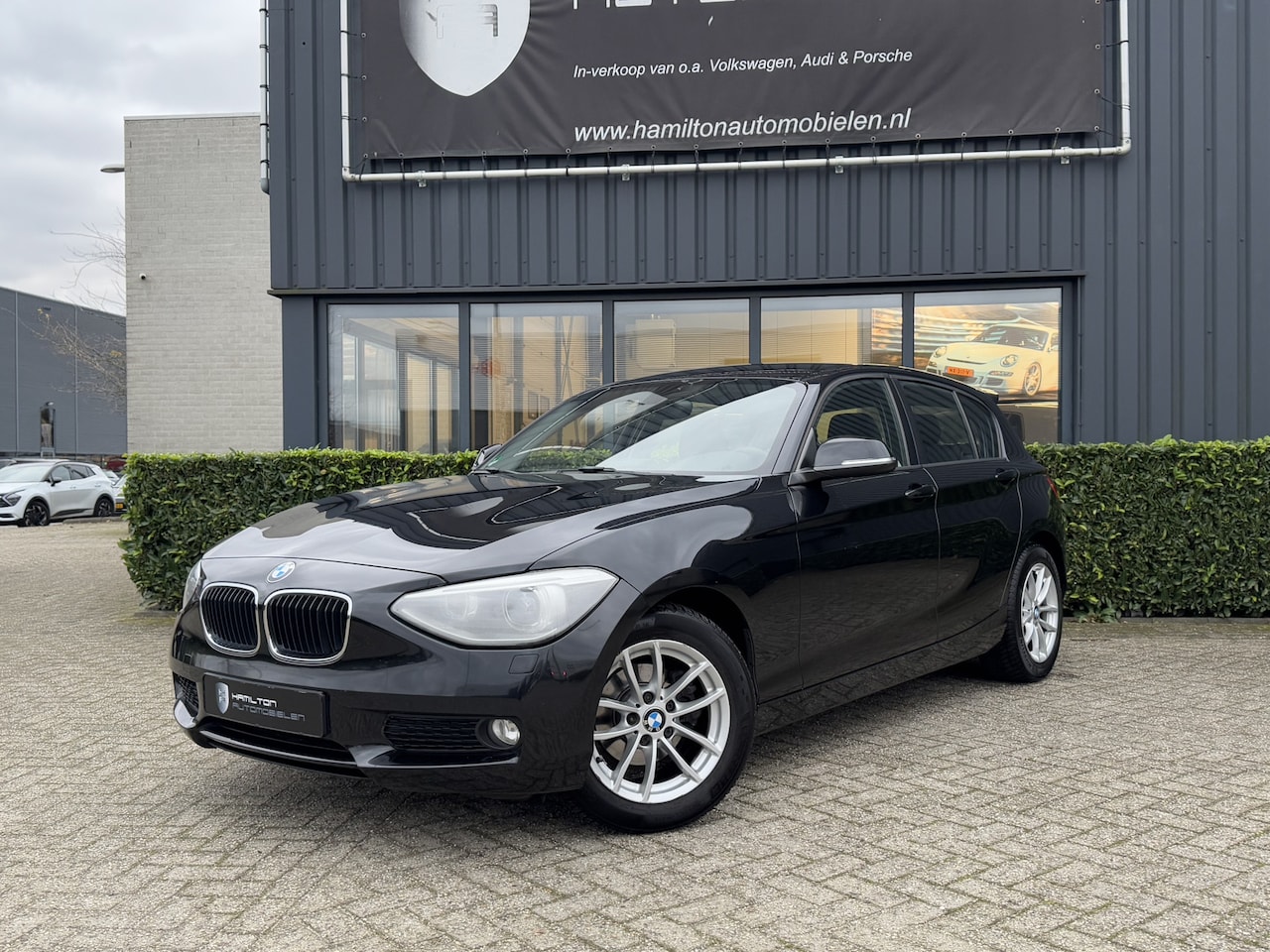 BMW 1-serie - 116i 136pk Aut. Sport Business Xenon Navi Sportstoelen NL Auto! - AutoWereld.nl