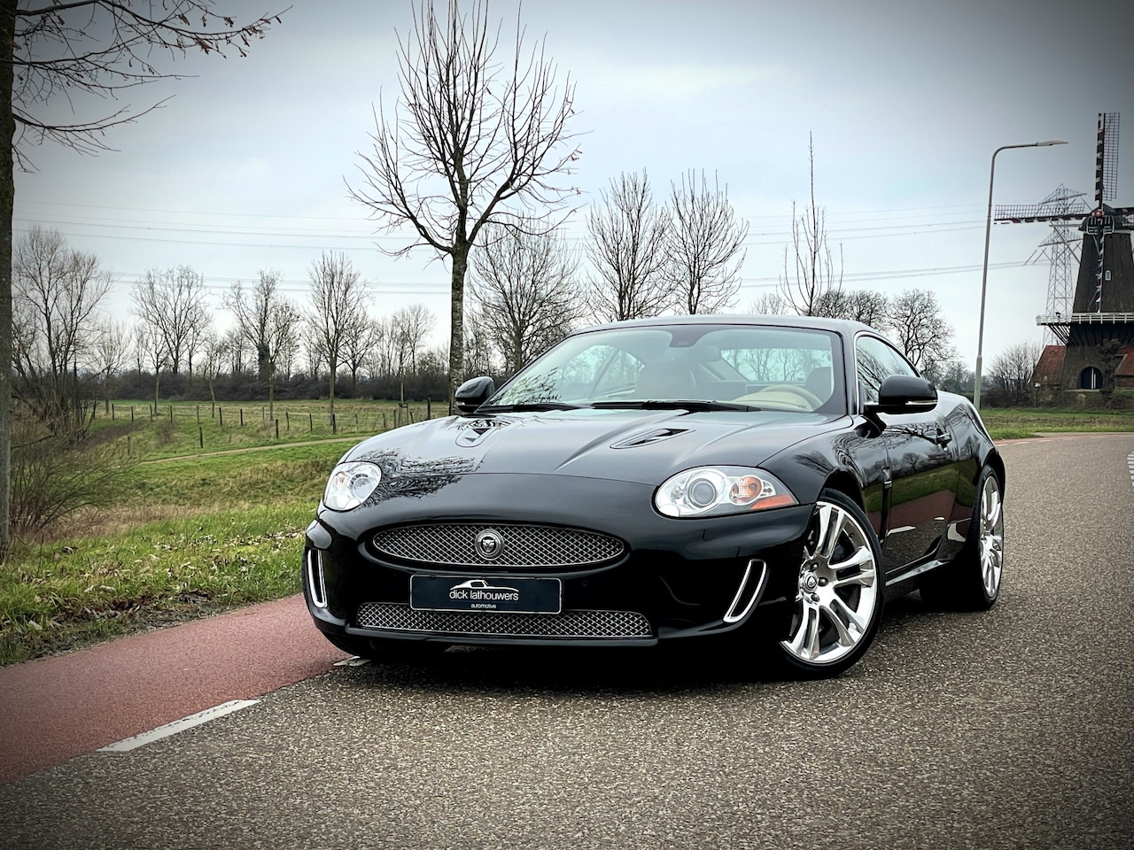 Jaguar XKR - 5.0 V8 S/C Coupé PORTFOLIO / YOUNGTIMER - AutoWereld.nl