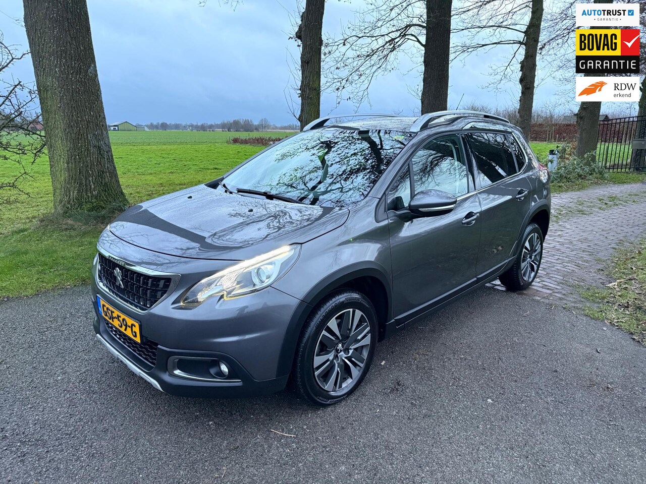 Peugeot 2008 - 1.2 PureTech Allure / Navi / Airco / Automaat / PDC / Apk - AutoWereld.nl