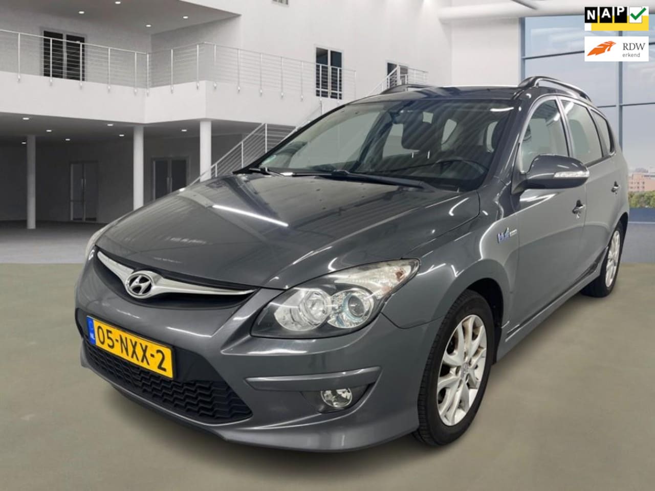 Hyundai i30 CW - 1.4i i-Motion/AIRCO/PSENSOR/CRUISE/BOEKJES/2XSLEUTELS - AutoWereld.nl