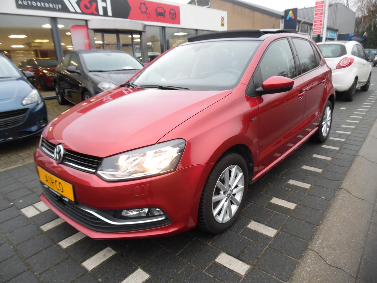 Volkswagen Polo - 1.2 TSI lounge automaat, cruise control, airco, stoelverwarming, sportvelgen, elektrisch, - AutoWereld.nl