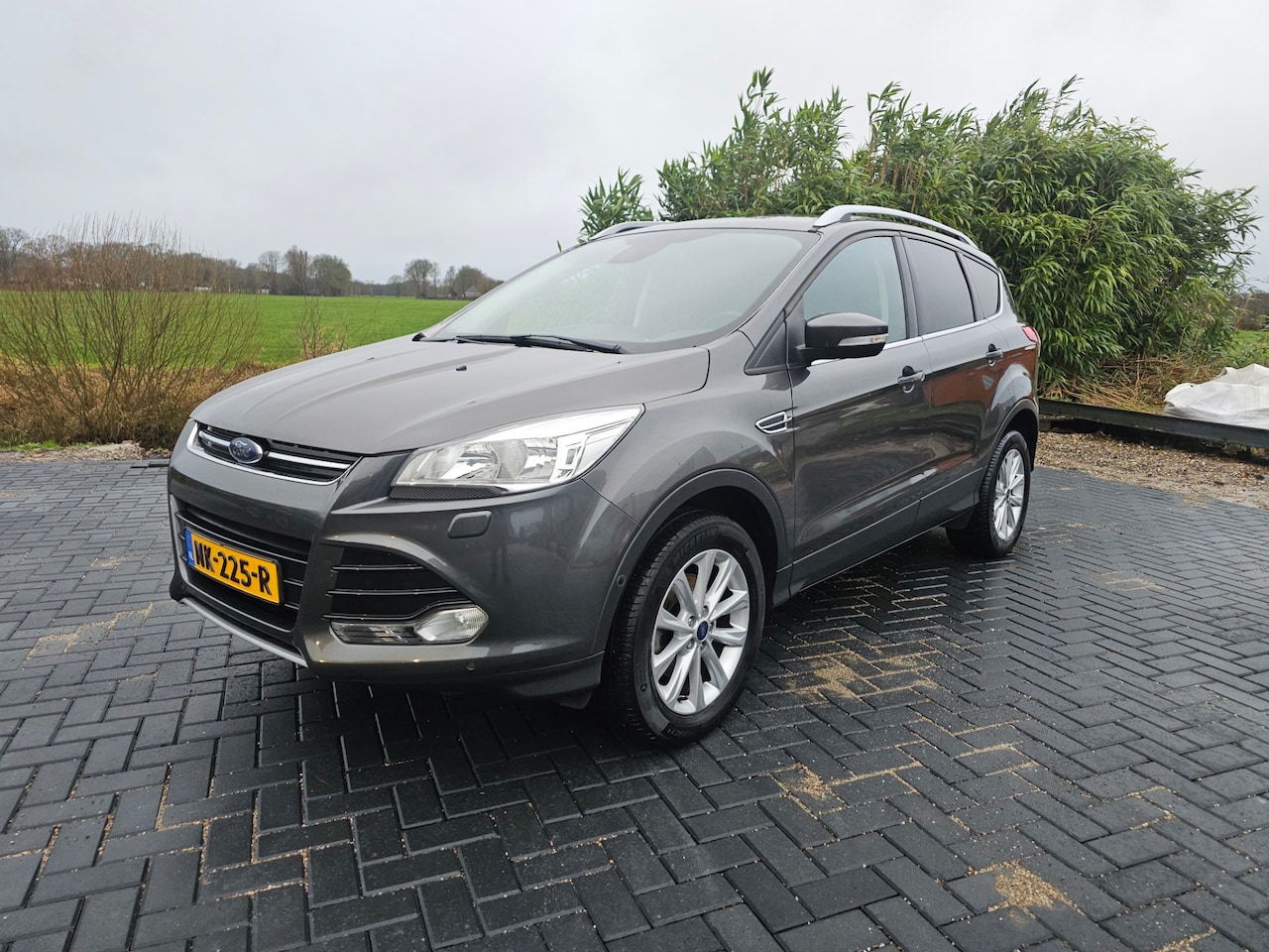 Ford Kuga - 1.5 Titanium 112.000km NIEUWSTAAT AUTO! - AutoWereld.nl