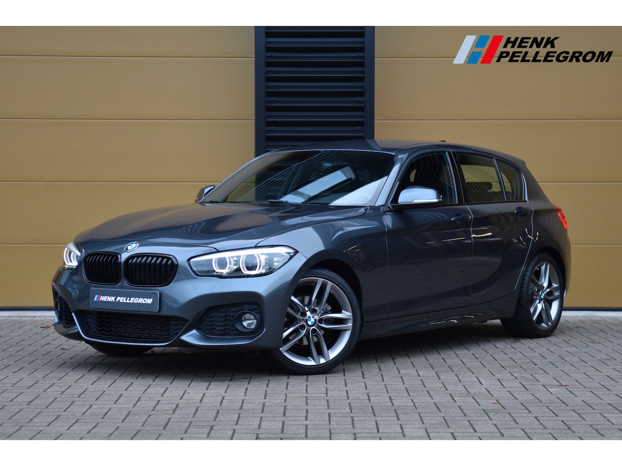 BMW 1-serie - 118i High Executive * M Sportpakket * HIFI * Navigatie Professional * LED * DAB * Leder * - AutoWereld.nl