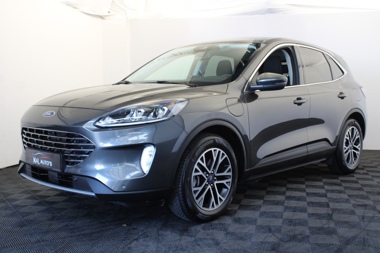 Ford Kuga - 2.5 PHEV Titanium |Navi|Stoel/stuur verwarming| - AutoWereld.nl