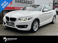 BMW 2-serie Cabrio - 218i Advantage 16"/Stoelverwarming/Trekhaak/LED/DAB/Climate/Cruise/Windscherm