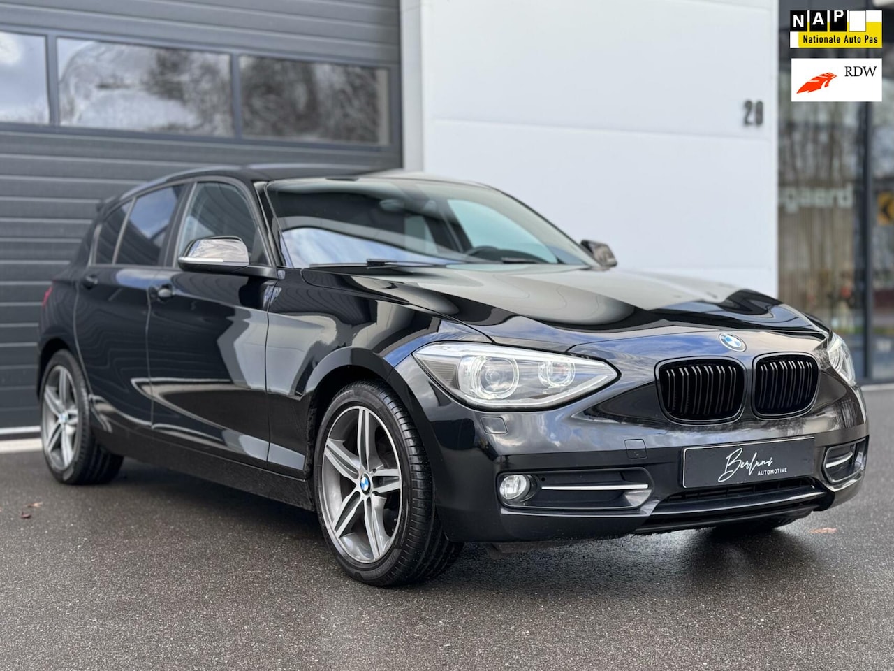 BMW 1-serie - 116i Sport Black Org NL | Leder | Cruise | Navi - AutoWereld.nl