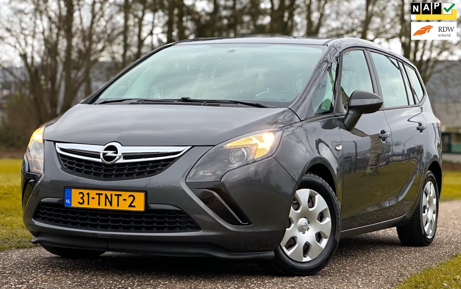 Opel Zafira Tourer - 1.4 Turbo 7-Persoon Airco|Trekhaak!! - AutoWereld.nl