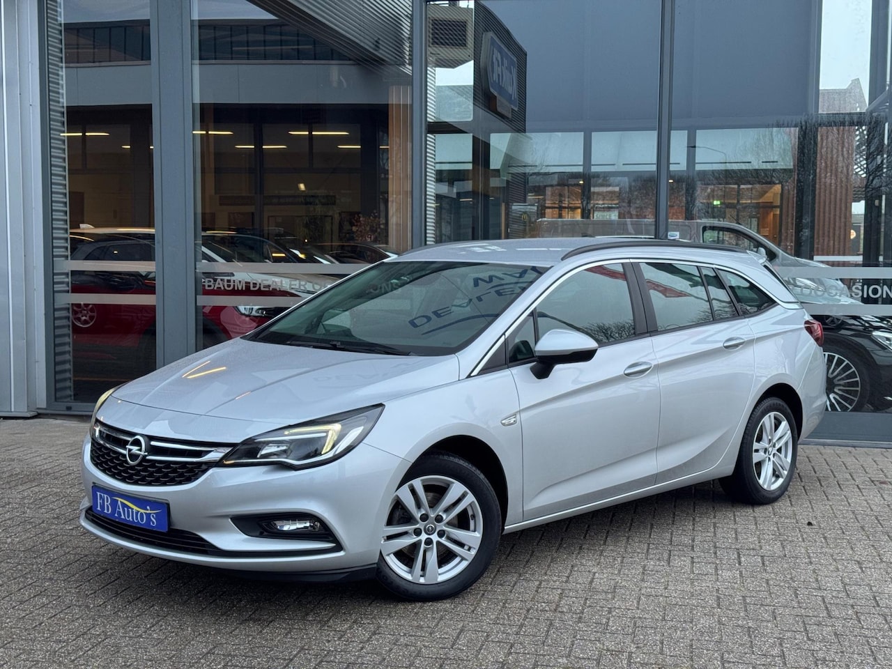 Opel Astra Sports Tourer - 1.4 Business+ Airco Lmv Cruise - AutoWereld.nl