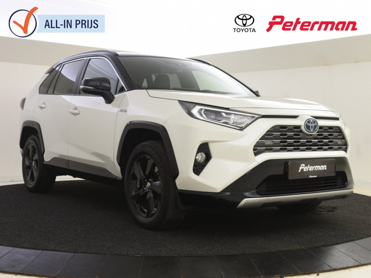 Toyota RAV4 - 2.5 AWD Hybrid Bi Tone | PDC V+A | Stoelverwarming | El ach - AutoWereld.nl