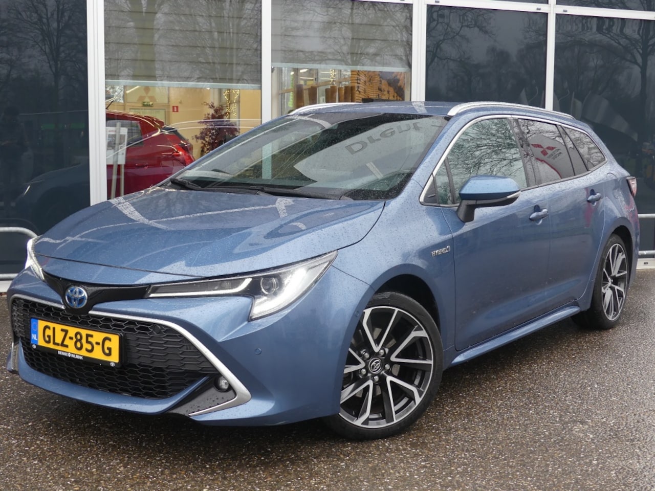 Toyota Corolla Touring Sports - 2.0 Hybrid Executive | Leder | Navigatie | Elektr achterklep - AutoWereld.nl