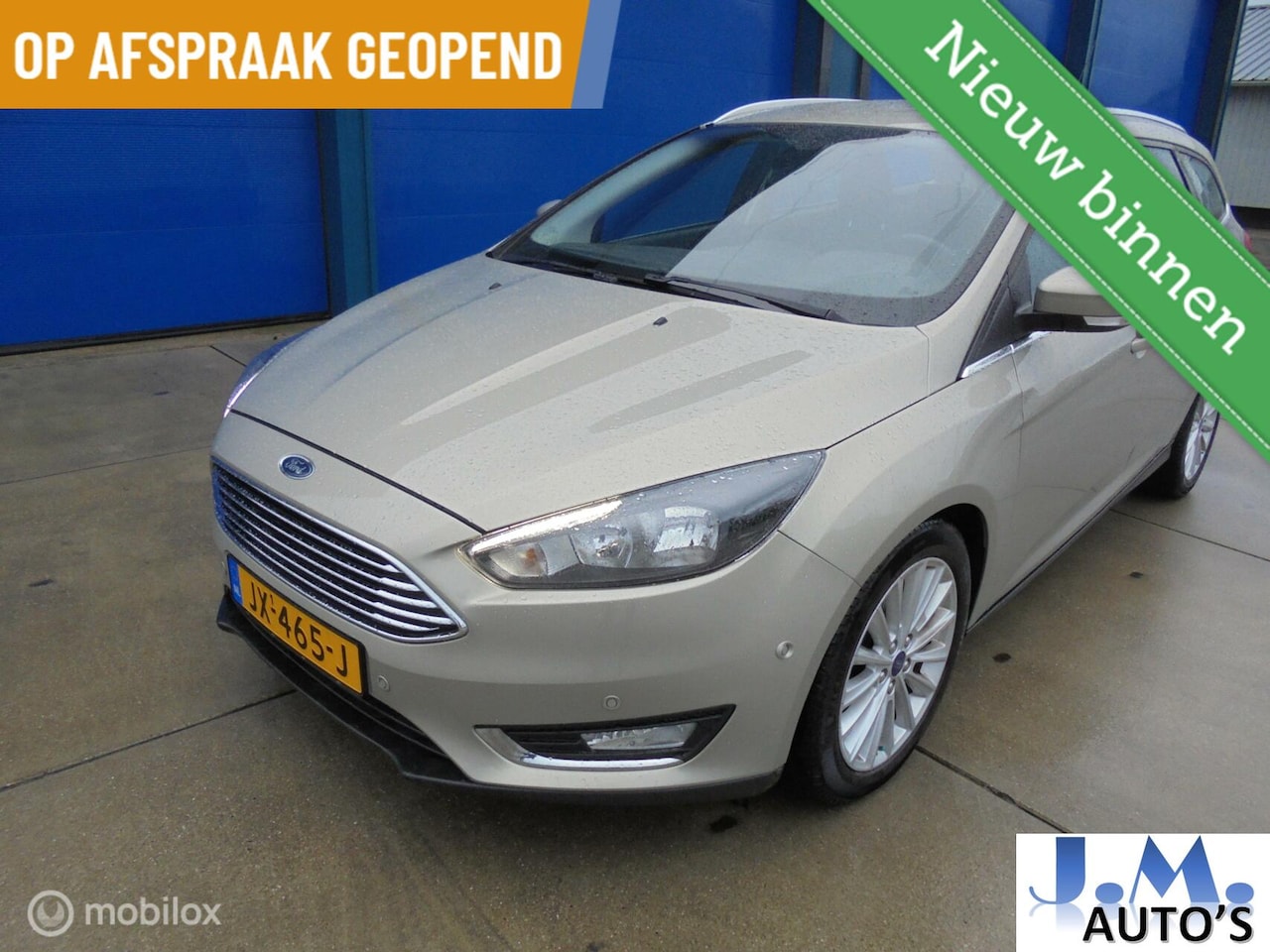 Ford Focus Wagon - 1.0 Titanium ZEER NETTE FORD VOL OPTIES - AutoWereld.nl