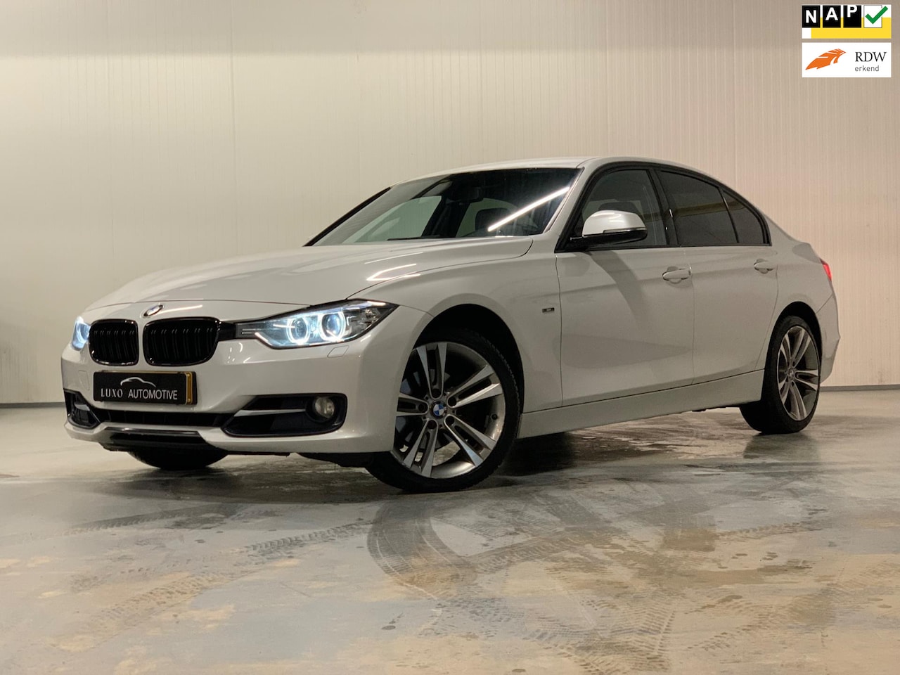 BMW 3-serie - 320i Upgrade Edition | NAP | SPORT LINE | SHADOW LINE | LEDER - AutoWereld.nl