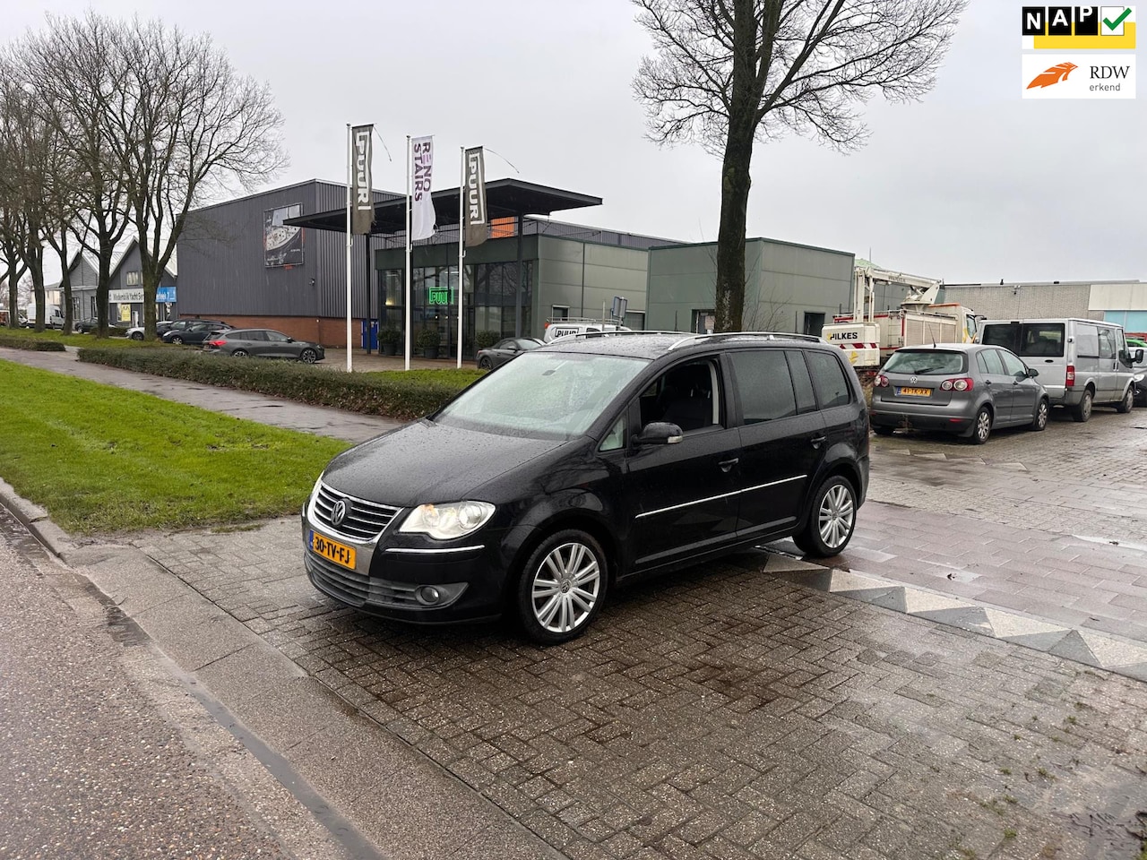 Volkswagen Touran - 1.4 TSI Highline Business Navi.Clima.Xnon - AutoWereld.nl