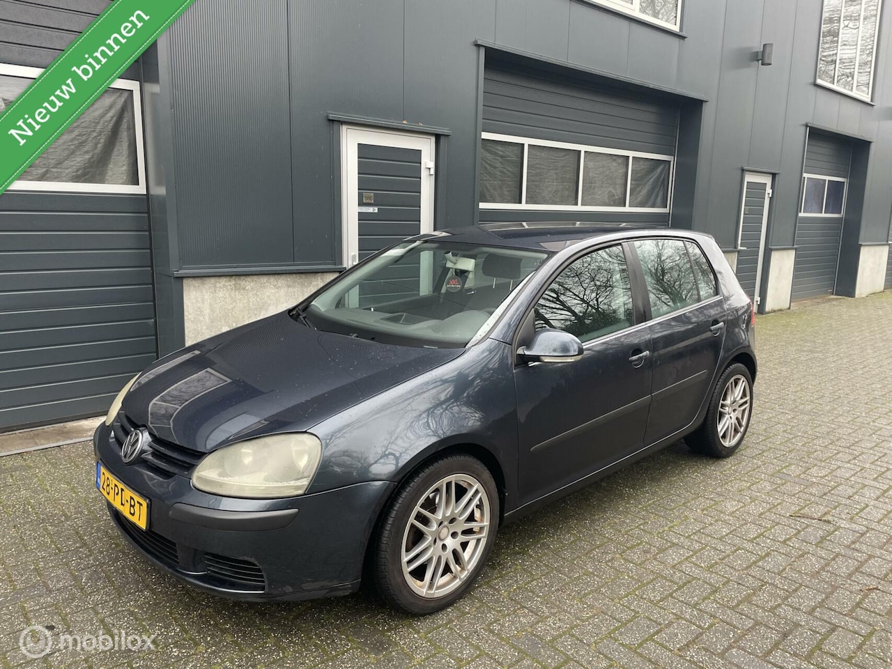 Volkswagen Golf - 1.4 FSI Sportline opties - AutoWereld.nl