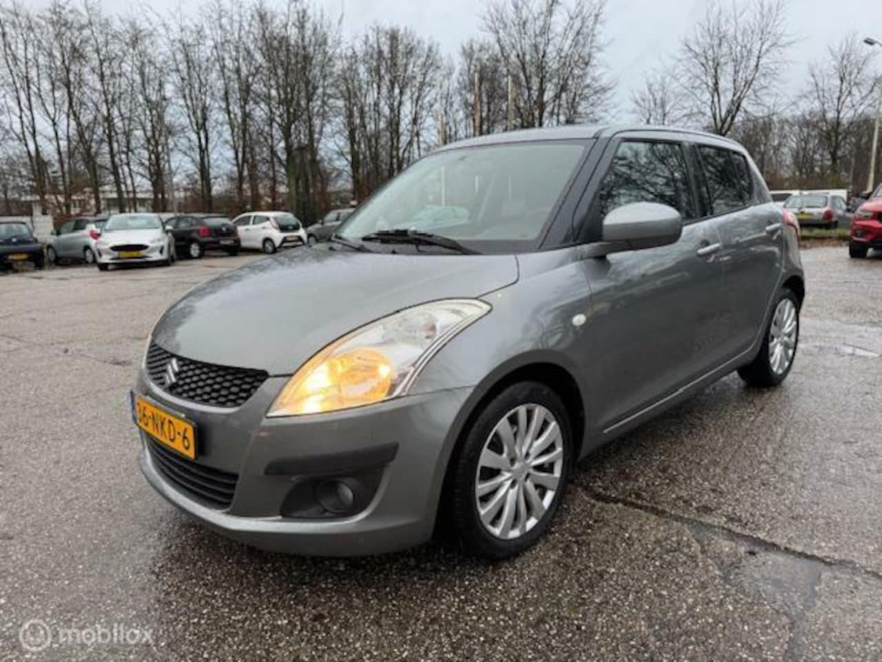 Suzuki Swift - 1.2 Exclusive Org. NL Auto+1E Eigenaar. - AutoWereld.nl