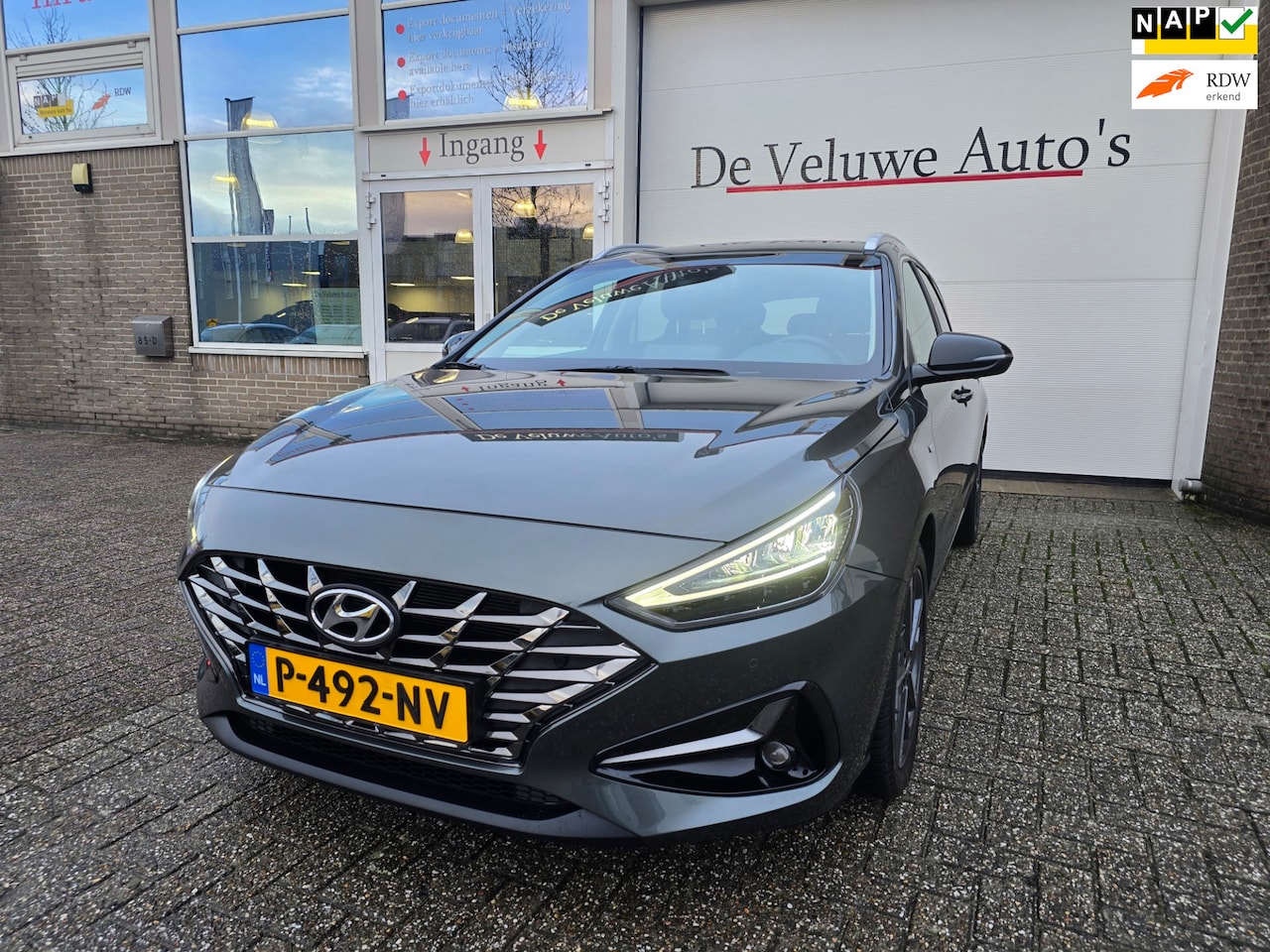 Hyundai i30 Wagon - 1.5 T-GDi MHEV Premium Apple Car trekhaak - AutoWereld.nl