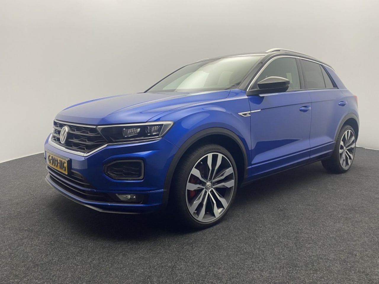 Volkswagen T-Roc - 1.5 TSI Sport Business R | Panoramadak | Camera | Stoelverwarming - AutoWereld.nl