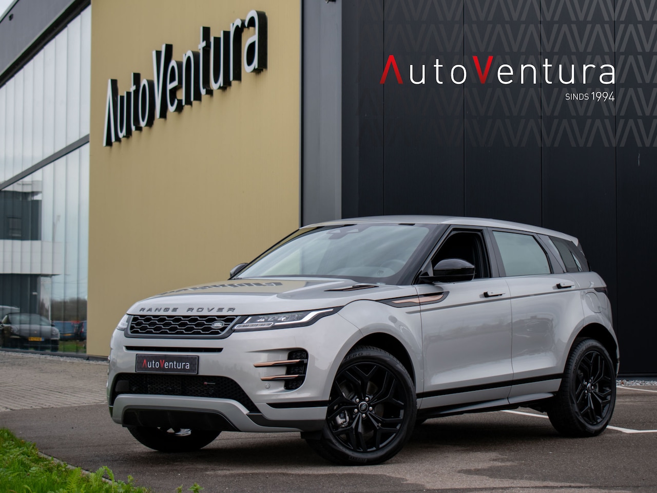 Land Rover Range Rover Evoque - 1.5 P300e AWD R-Dynamic | Cold Climate Pack | Leder | Keyless | 20'' - AutoWereld.nl