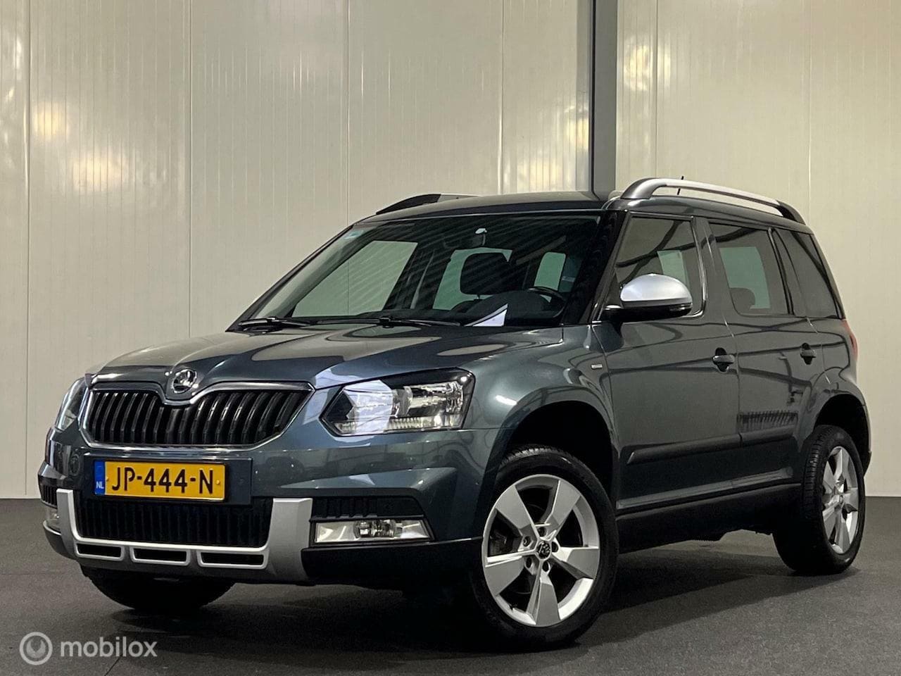 Skoda Yeti Outdoor - 1.2 TSI Greentech JOY AUTOMAAT [ NAP trekhaak navigatie ] - AutoWereld.nl