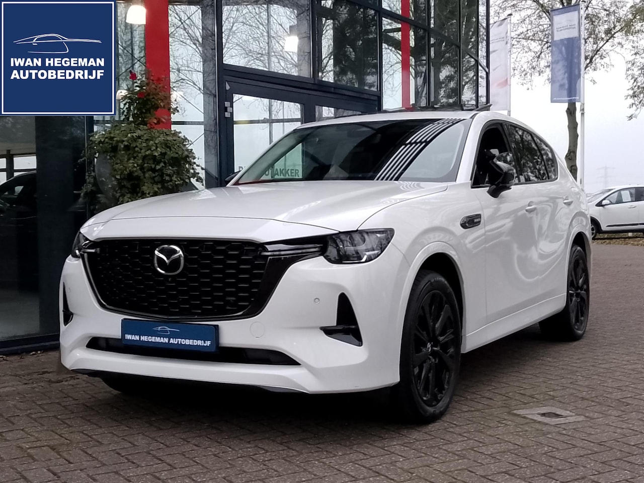 Mazda CX-60 - 2.5 e-SkyActiv PHEV Homura | Leer | Panodak | Navi | Trekhaak | LM Velgen | PDC | Cruise C - AutoWereld.nl