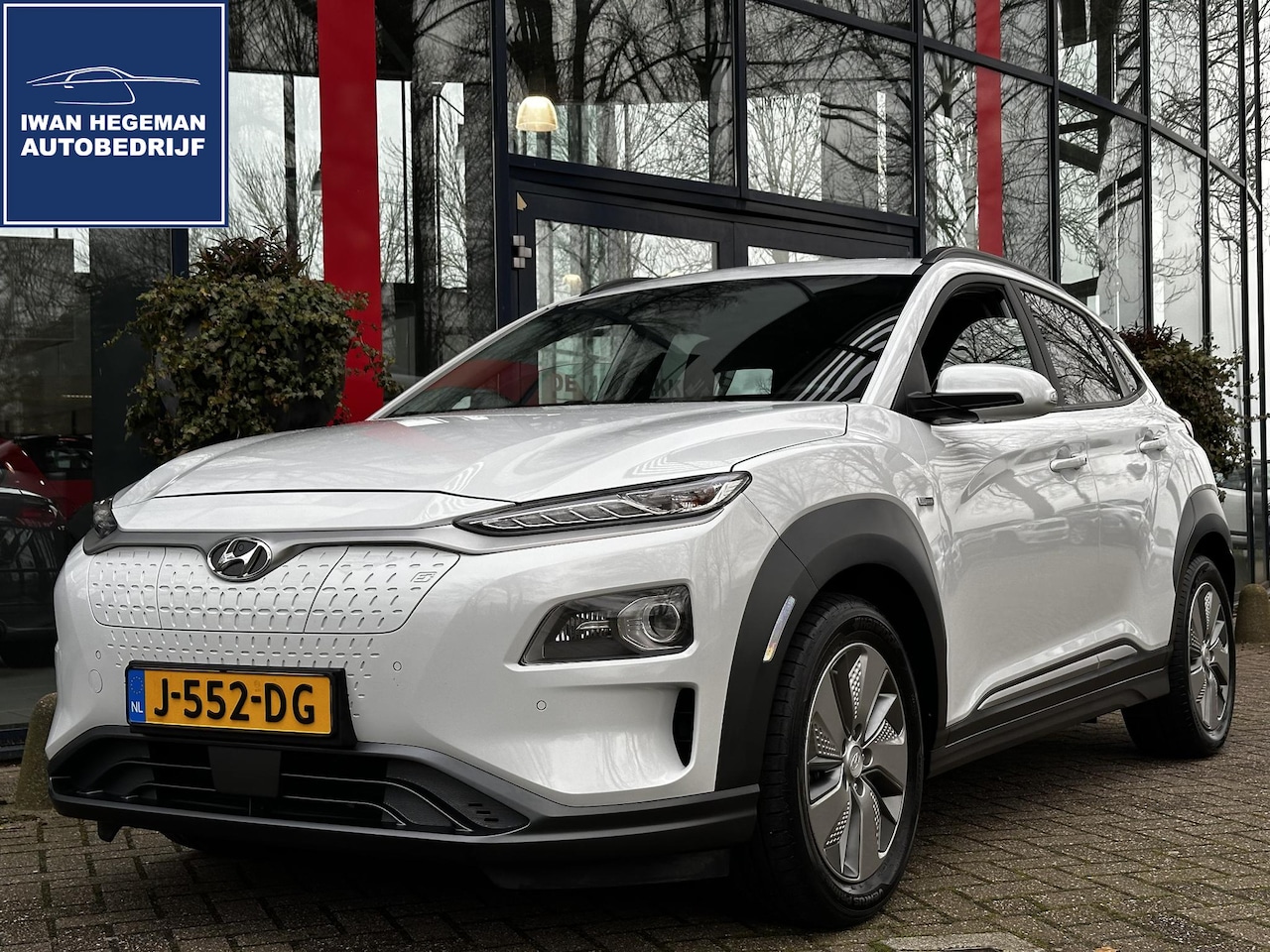 Hyundai Kona Electric - EV Premium 64 kWh 100% Electrisch | Navi | Leer | Camera | Cruise Control | LM velgen - AutoWereld.nl