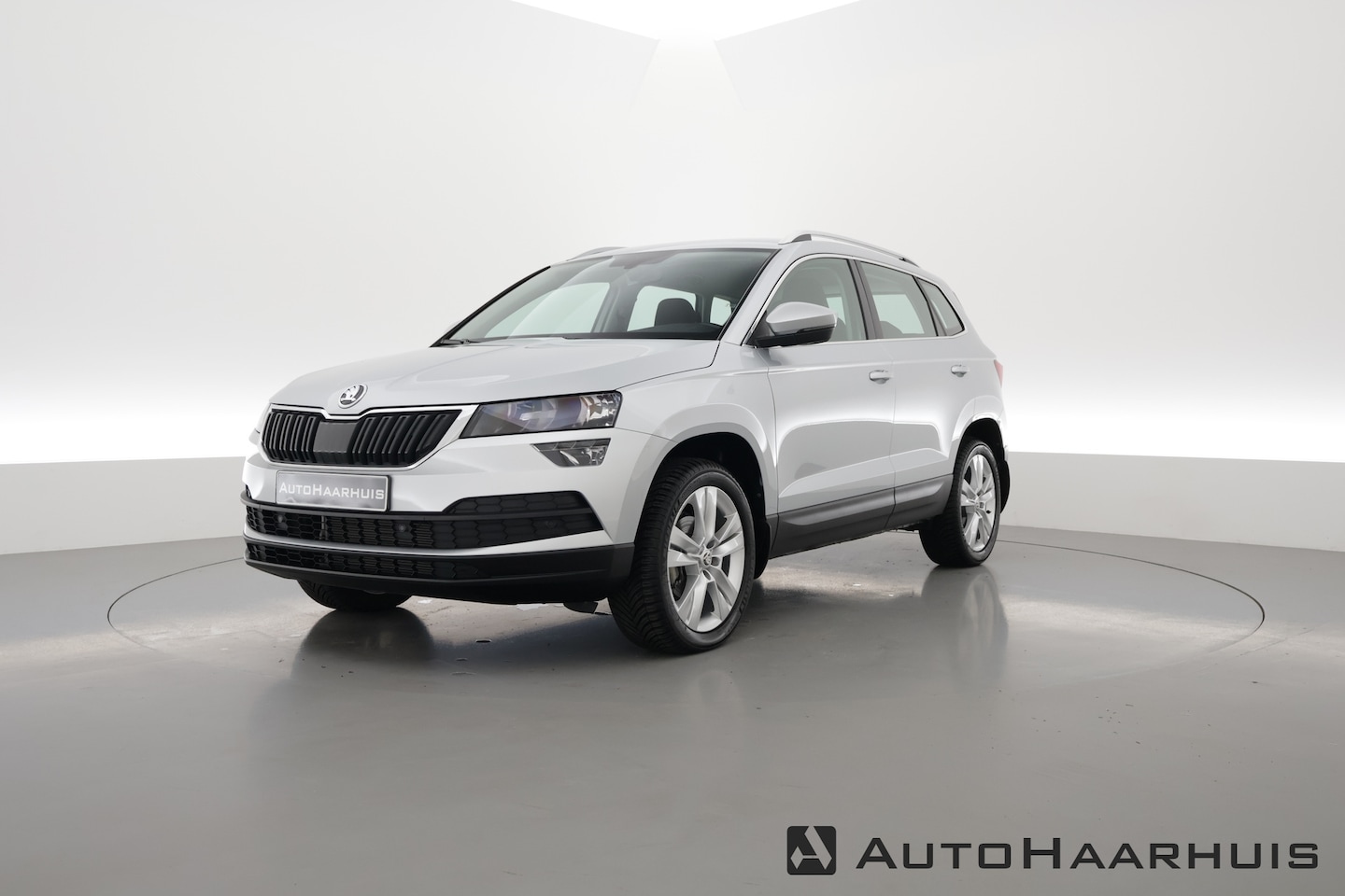 Skoda Karoq - 1.5 TSI ACT Style DSG | Navi by App | Keyless | Stoelverw. | 18'' | PDC - AutoWereld.nl