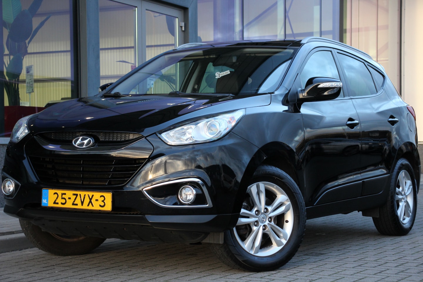 Hyundai ix35 - 2.0i Business Edition Navi | Camera | Pano. dak |  Climate & Cruise Control - AutoWereld.nl