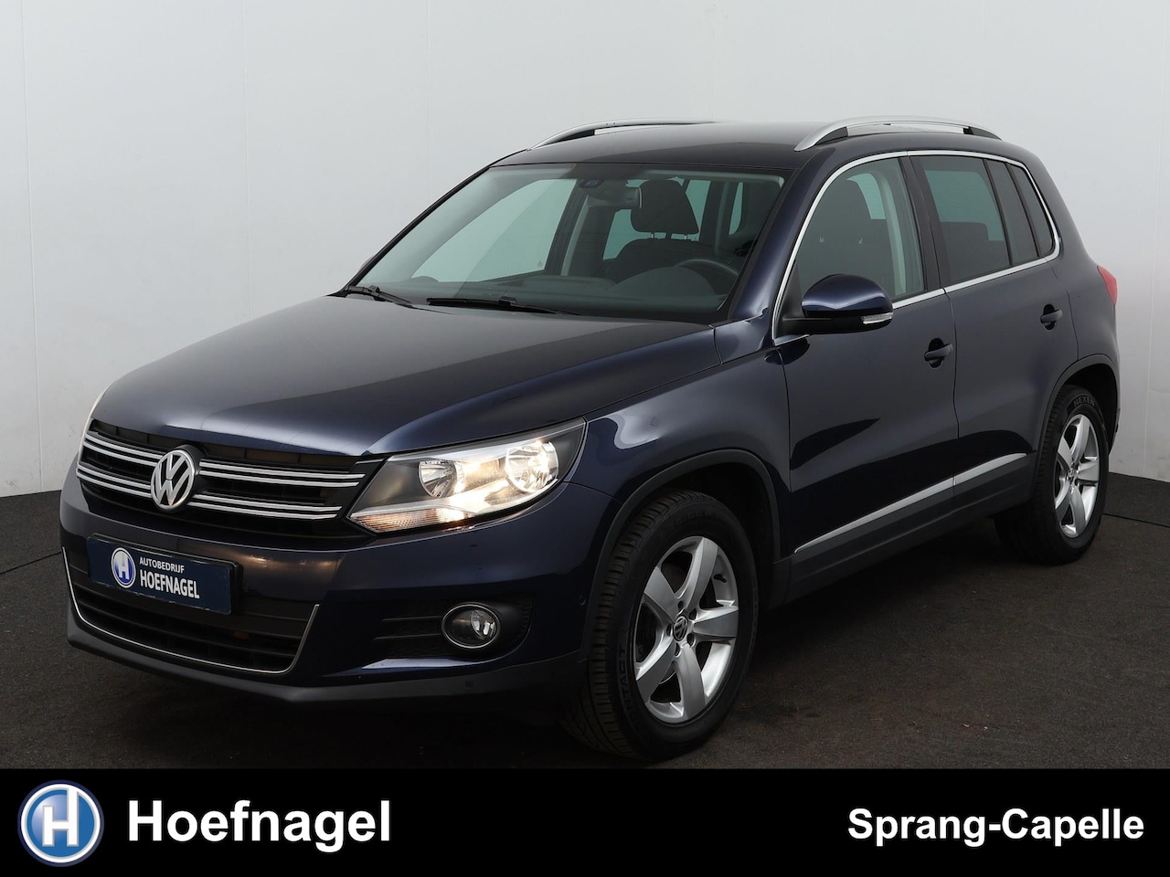 Volkswagen Tiguan - 1.4 TSI Sport&Style | Navi | Trekhaak | Cruise | - AutoWereld.nl