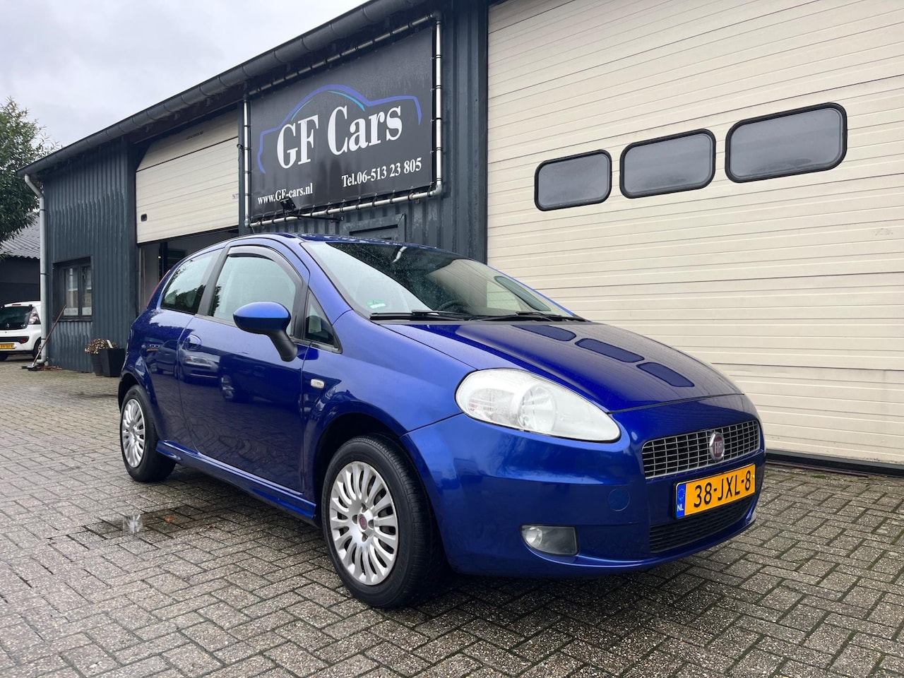 Fiat Grande Punto - 1.4 NeroBianco 2009 APK NAP AIRCO - AutoWereld.nl