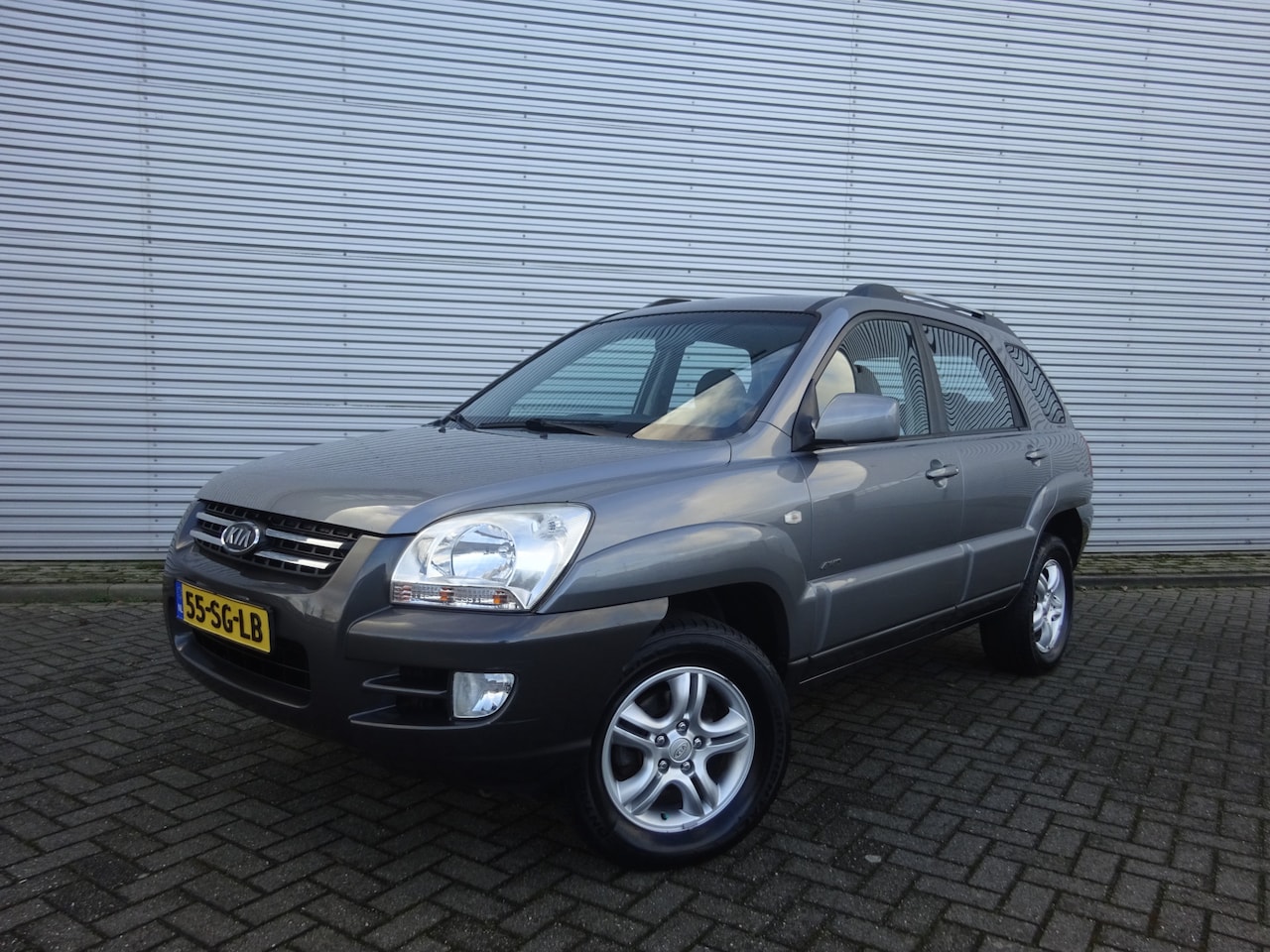 Kia Sportage - 2.0 CVVT Comfort - 4WD / 1e Eigenaar / Airco / Elektr. ramen / Cruise control / NAP - AutoWereld.nl