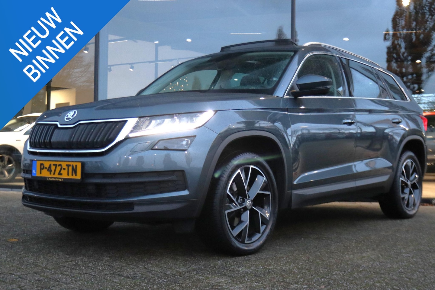 Skoda Kodiaq - 1.5 TSI AUT. SPORTLINE BUSINESS | PANO | ADAP. CRUISE | CLIMATE | CARPLAY | STOELVERW. | K - AutoWereld.nl