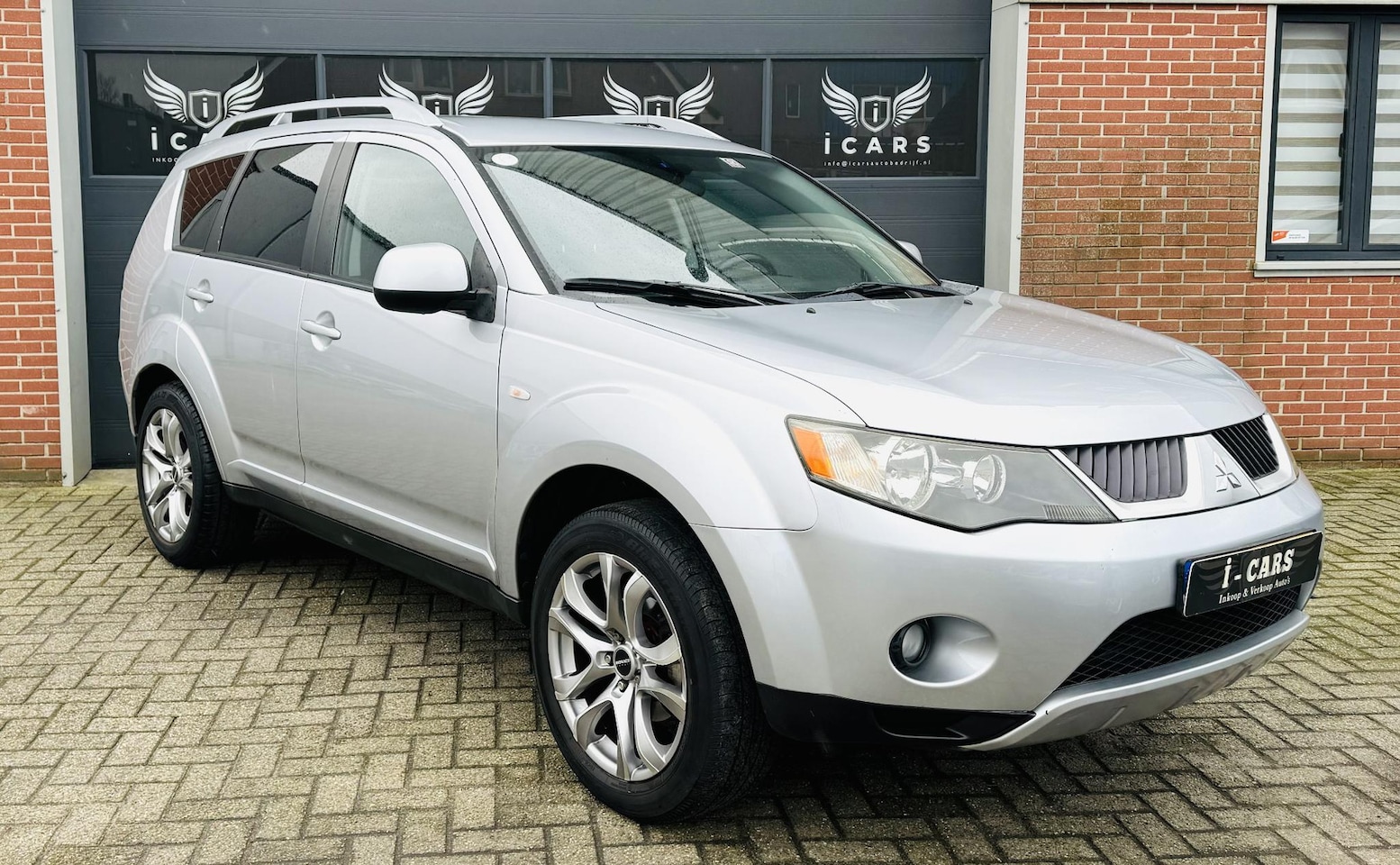 Mitsubishi Outlander - 2.4 Intense+ 7pers 2e eigenaar afneembare trekhaak - AutoWereld.nl