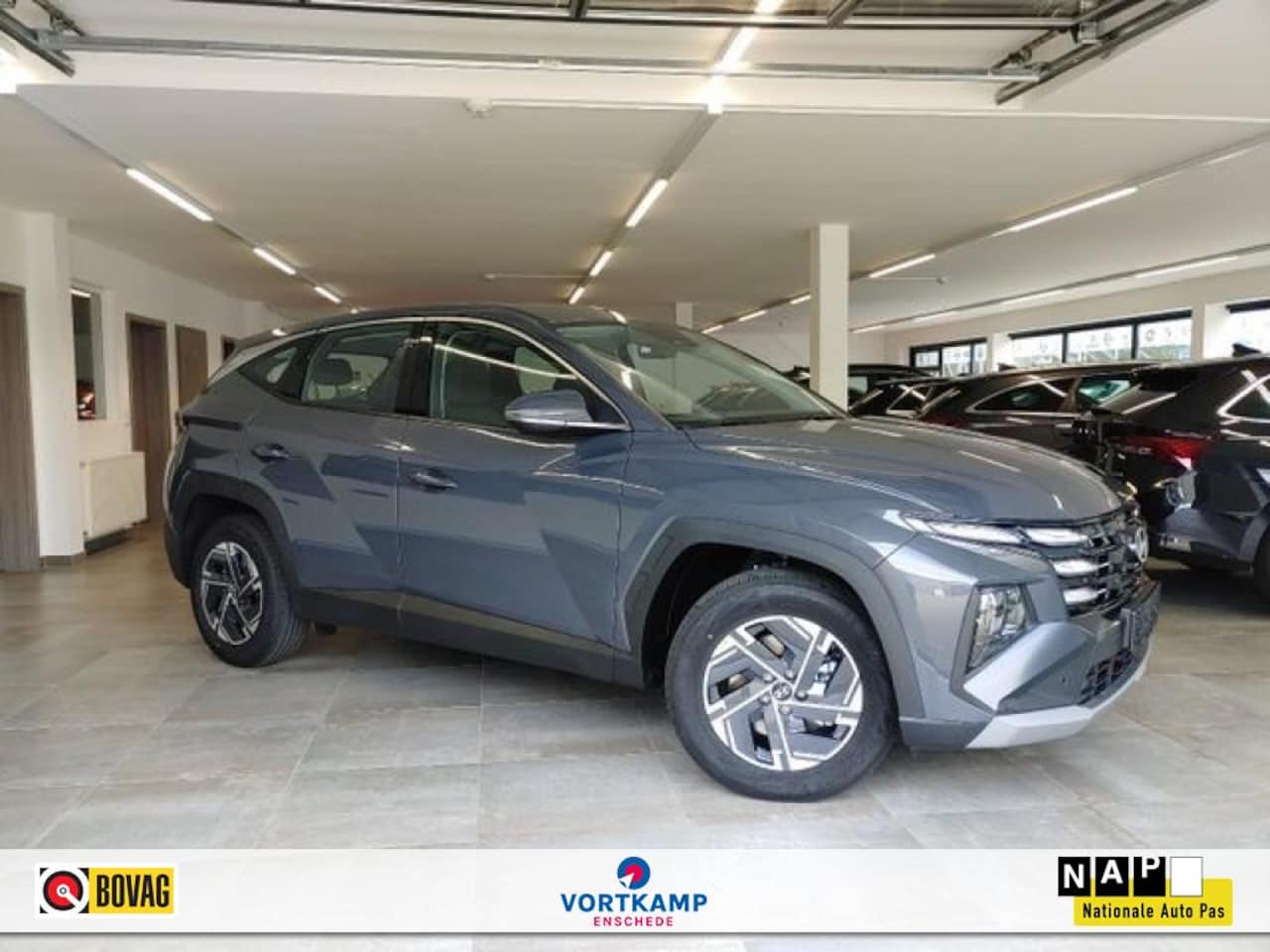 Hyundai Tucson - 1.6 T-GDI COMFORT CAMERA/NAVI/LED/CARPLAY/STOELVERW - AutoWereld.nl