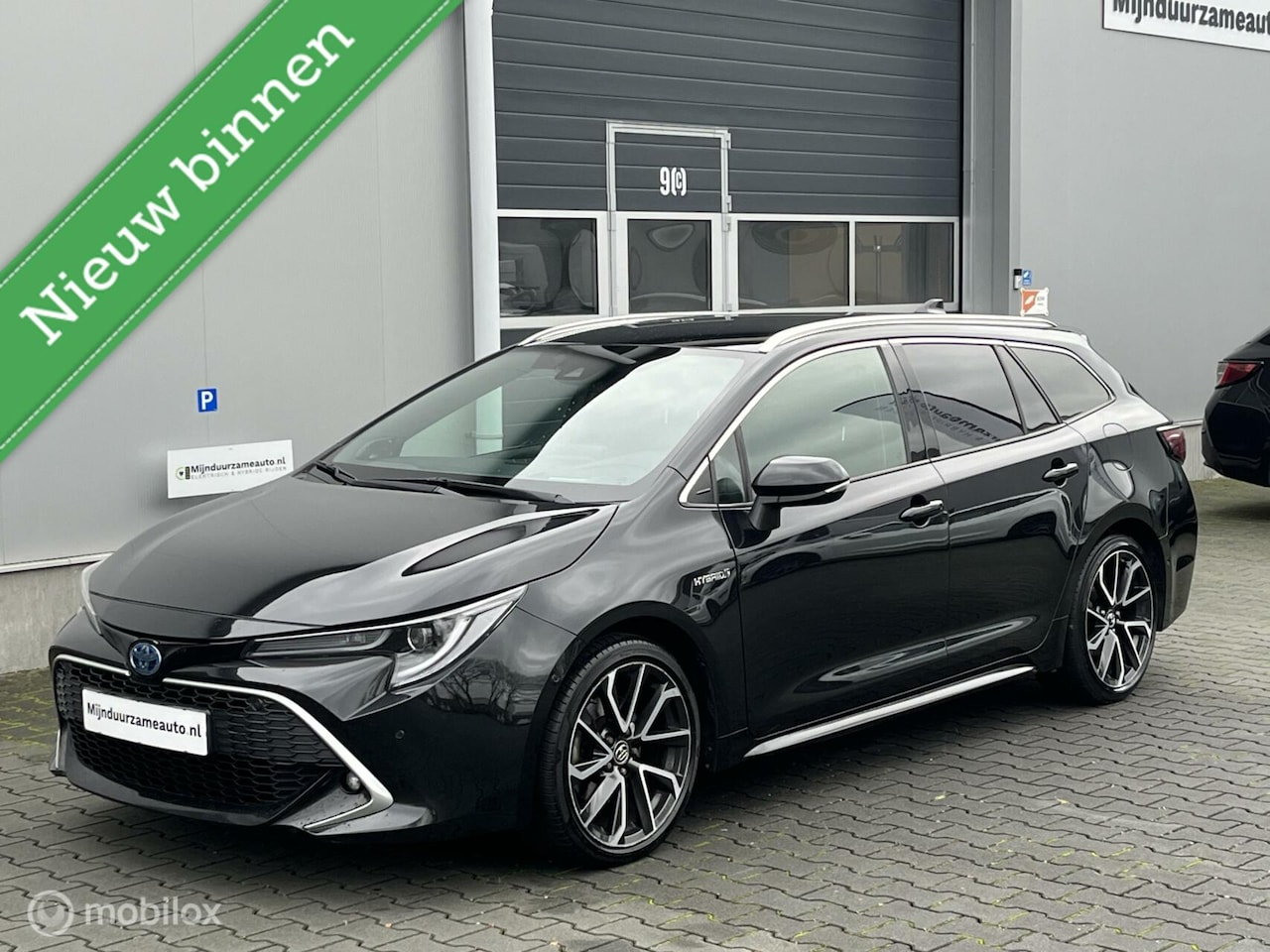 Toyota Corolla Touring Sports - 2.0 Hybrid Exe, JBL, Trekhaak - AutoWereld.nl