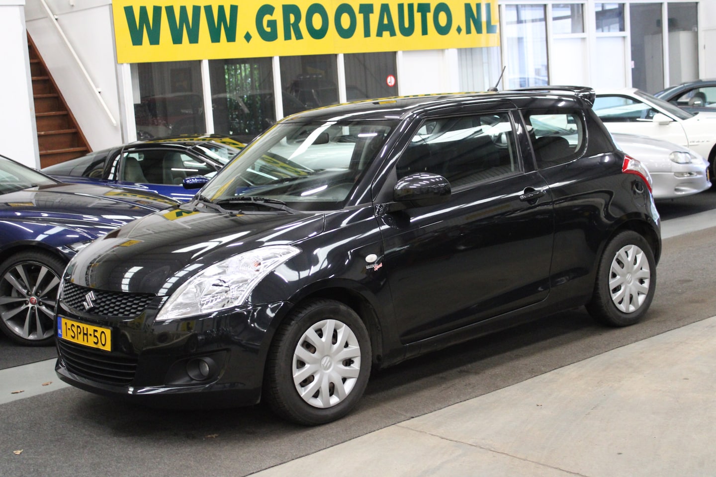 Suzuki Swift - 1.2 Comfort Airco, Volledig onderhouden, Stoelverwarming - AutoWereld.nl