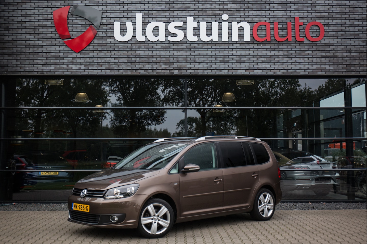 Volkswagen Touran - 1.2 TSI Comfortline BlueMotion 7p. 1.2 TSI Comfortline BlueMotion 7p. , Pano, Trekhaak, PDC - AutoWereld.nl