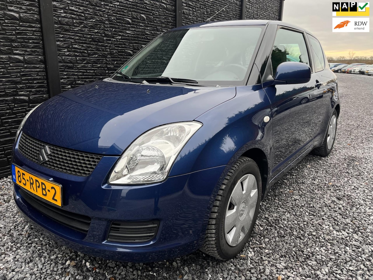 Suzuki Swift - 1.3 Base 1.3 Base, GOED ONDERHOUDEN, AIRCO, APK T/M 02-12-25, Electr ramen - AutoWereld.nl