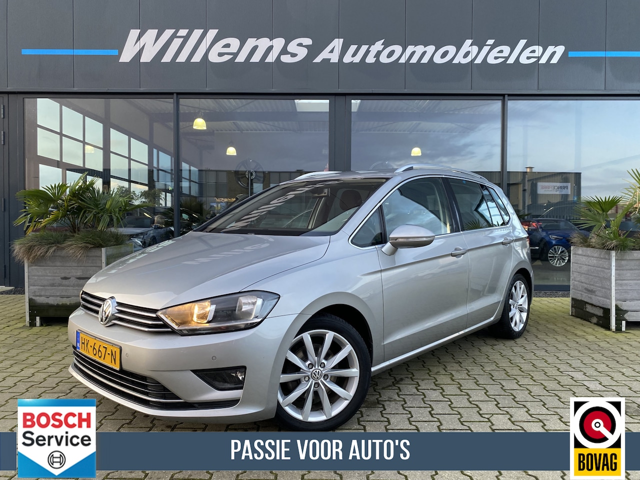 Volkswagen Golf Sportsvan - 1.4 TSI Highline Trekhaak , Navigatie , camera - AutoWereld.nl