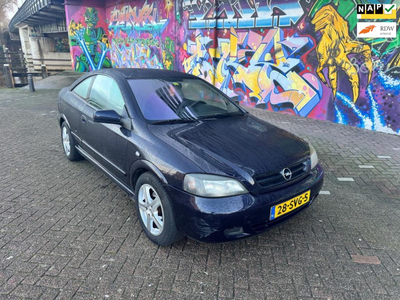 Opel Astra Coupé - 2.2-16V automaat elektrisch pakket sport velgen airco stereo inruil koopje bouwjaar 2004 - AutoWereld.nl