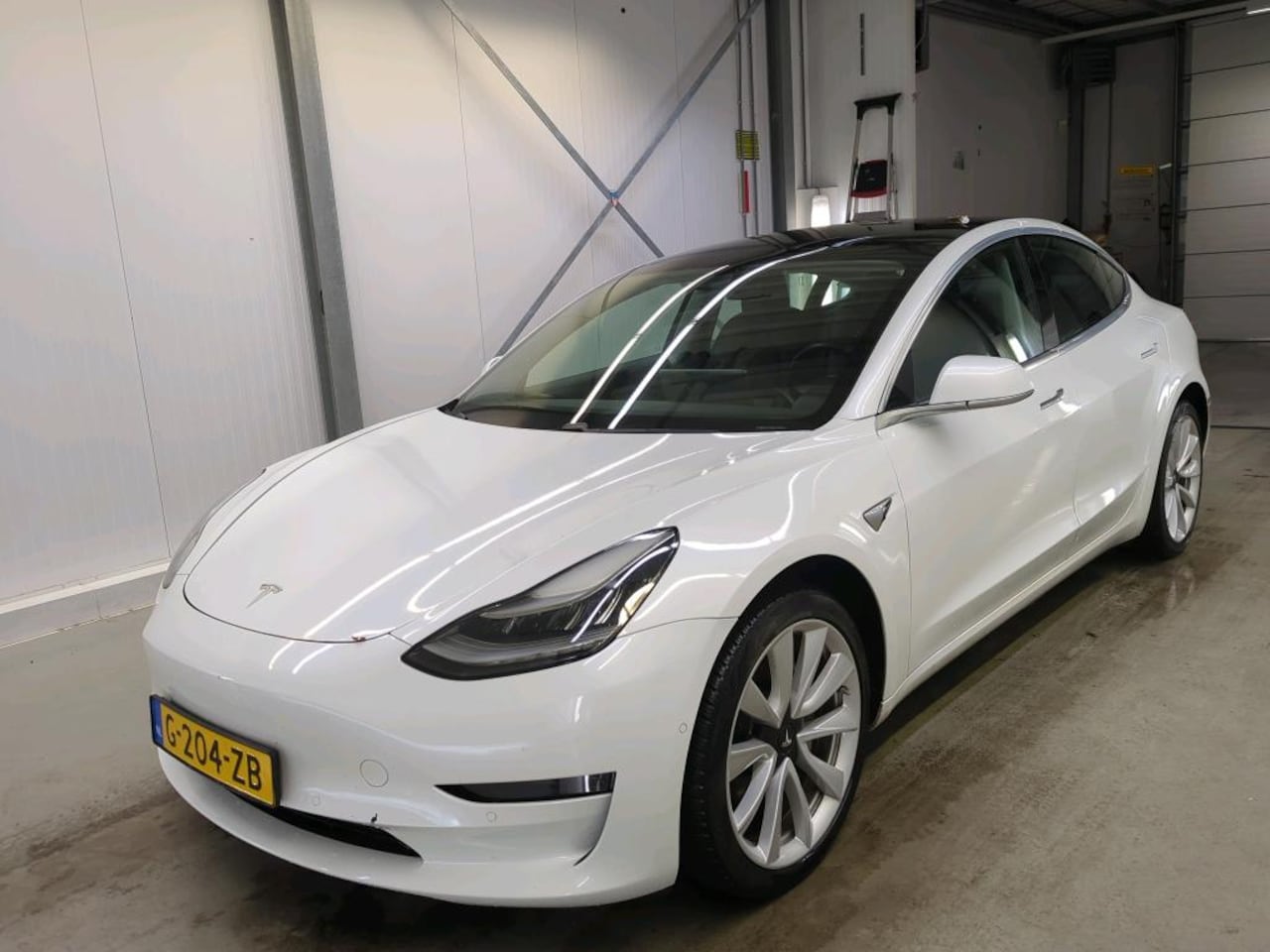 Tesla Model 3 - Long-Range AWD 351pk 75 kWh [ AUTOPILOT+19" LMV+620KM WLTP+PREMIUM AUDIO ] - AutoWereld.nl