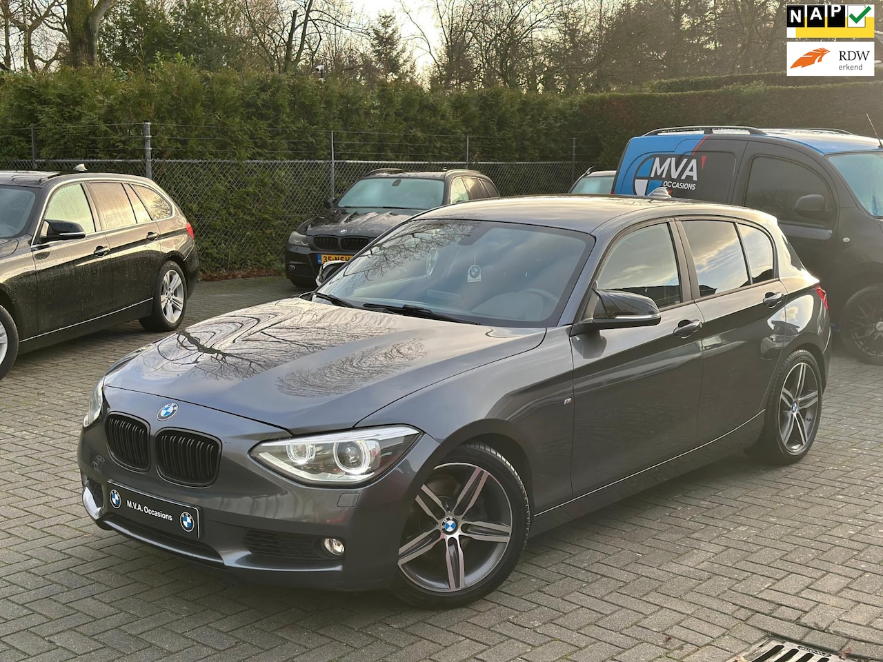 BMW 1-serie - 118i Business+ Sport|Nwe Ketting + Klepseals|Navi|Airco|Cruise control|Nette staat... - AutoWereld.nl