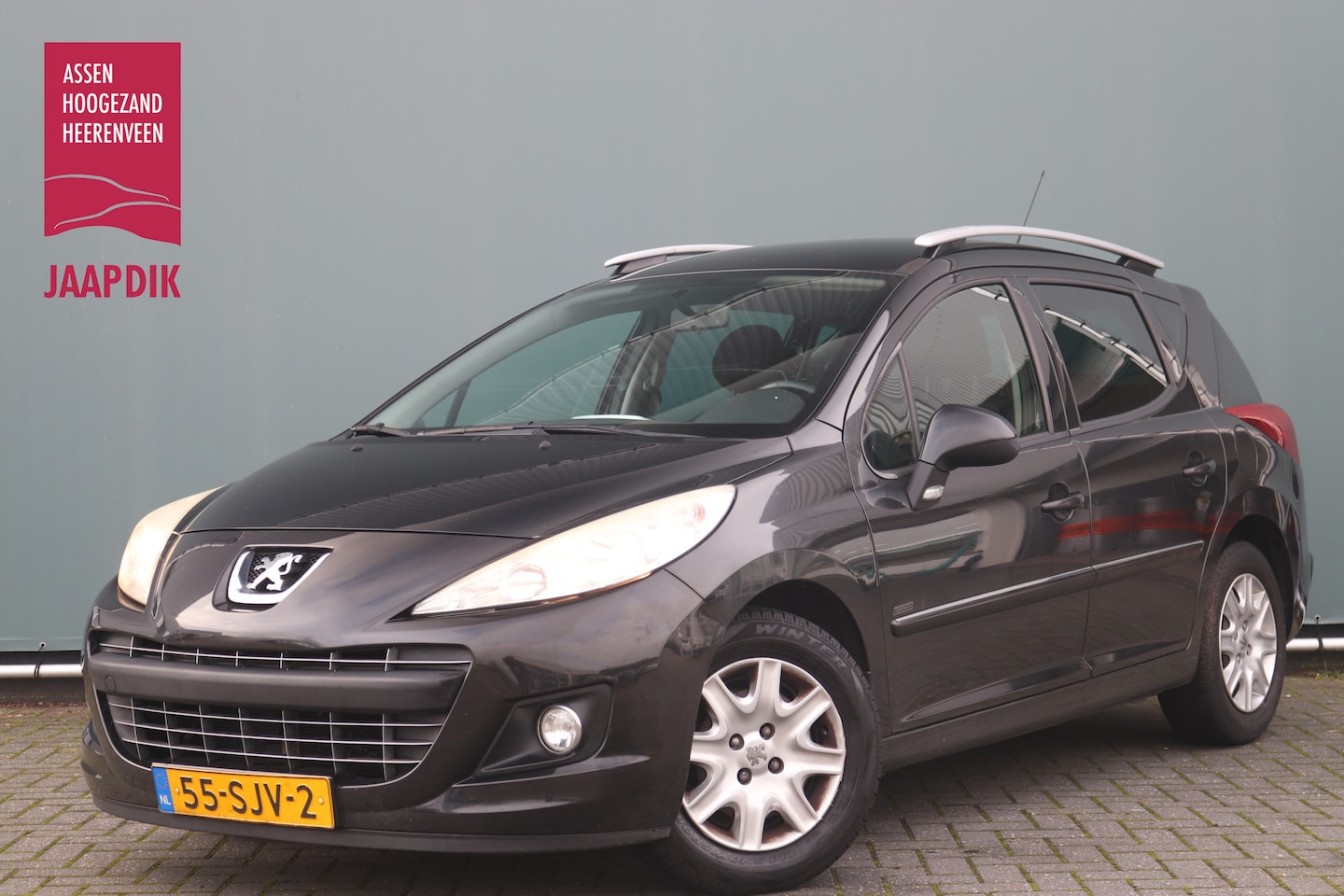 Peugeot 207 SW - BWJ 2011 1.4 VTi 96 PK Sportium TREKHAAK / AIRCO / PRIV. GLAS / CRUISE / STUURBEKRACHTIGIN - AutoWereld.nl