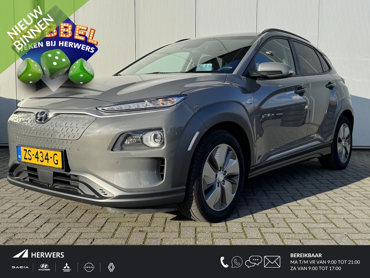 Hyundai Kona Electric - EV Premium 64 kWh / Lederen Bekleding / Navigatie / Achteruitrij camera / Adaptive Cruise - AutoWereld.nl