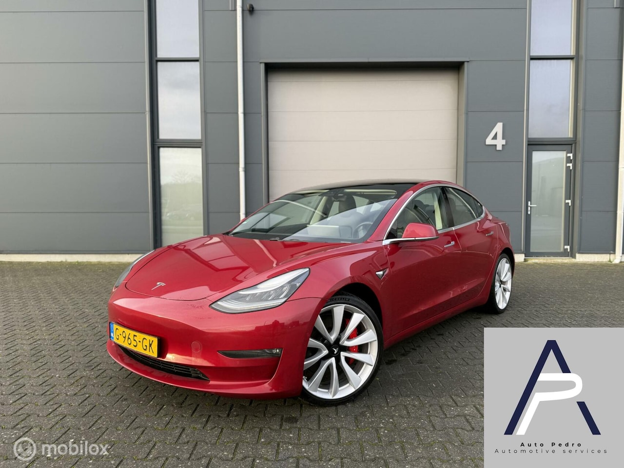 Tesla Model 3 - Performance AWD 75 kWh Ruby Red - AutoWereld.nl